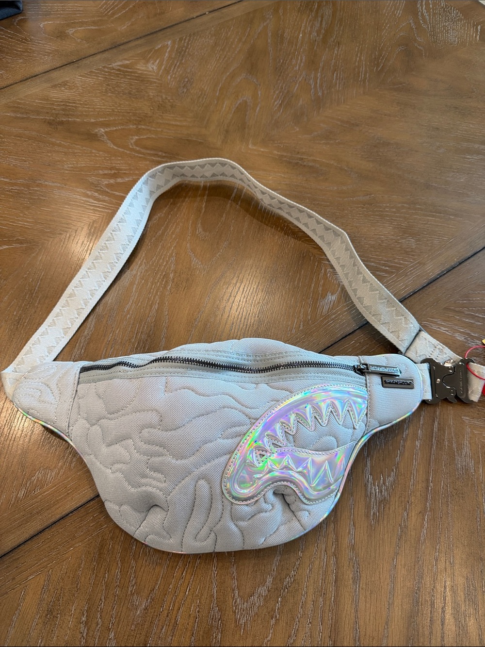 Sprayground Light Gray Quilted Belt Bag with Iridescent Shark Accent